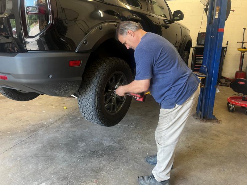 Mechanic working on a lift